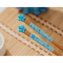 Silver Buffalo Disney Lilo & Stitch 2-Pair Wooden Chopstick Set With Ceramic Rests -Disney Sales Store GUEST 1add1aee c914 4689 b37d 37f8f2c439a5