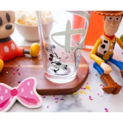 Disney 100 Years Of Wonder Glitter Pint Glass | Holds 16 Ounces -Disney Sales Store GUEST 757a55b1 8855 4181 849b aac7aa7e5fd7