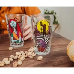 Silver Buffalo Disney Nightmare Before Christmas Jack & Sally 16-Ounce Pint Glasses | Set Of 4 -Disney Sales Store GUEST 8608e55a 4ebf 4d92 9e17 7b607075f88f