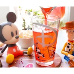 Disney 100 Years Of Wonder Glitter Pint Glass | Holds 16 Ounces -Disney Sales Store GUEST 8e4f5516 b63d 41ec a15a f4f800b2f21c