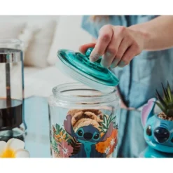 Silver Buffalo Disney Lilo & Stitch Glass Snack Jar Container With Lid | 6 Inches Tall -Disney Sales Store GUEST b73c1062 0e01 40e1 a8fc 75fa9e95d348