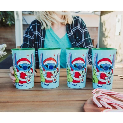Silver Buffalo Disney Lilo & Stitch Santa Stitch 4-Piece Plastic Cup Set | Each Holds 22 Ounces 2 Silver Buffalo Disney Lilo & Stitch Santa Stitch 4-Piece Plastic Cup Set | Each Holds 22 Ounces - Image 2